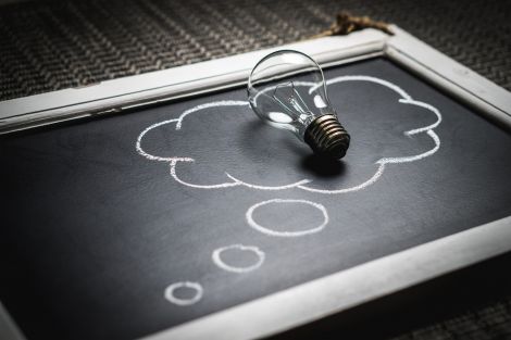 Light bulb in thought bubble
