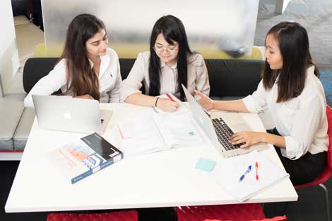Group of students studying at a table