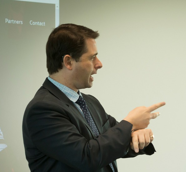 Man using Auslan to communicate